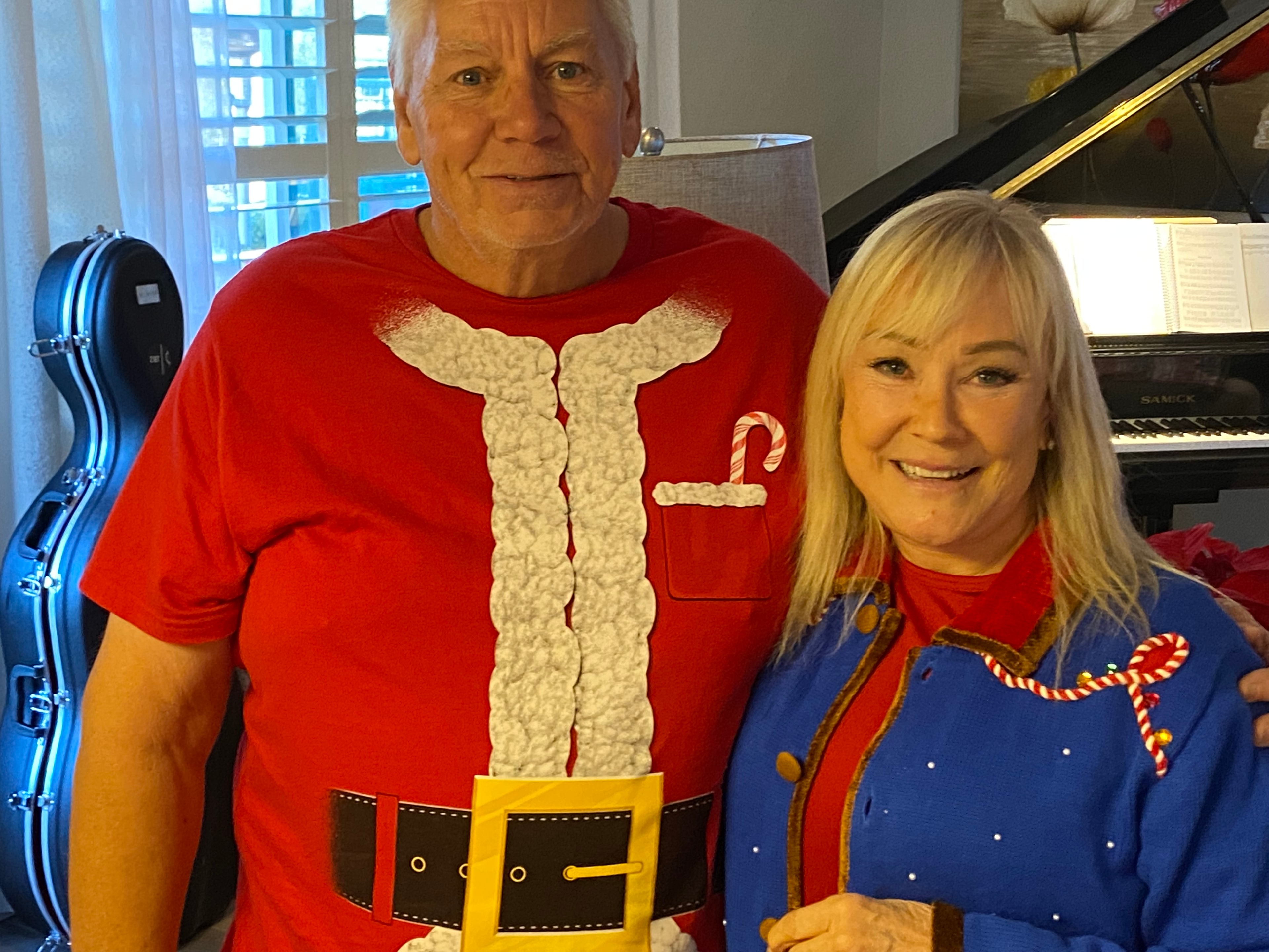 Couple in festive Christmas attire at Windrock Farm Christmas party