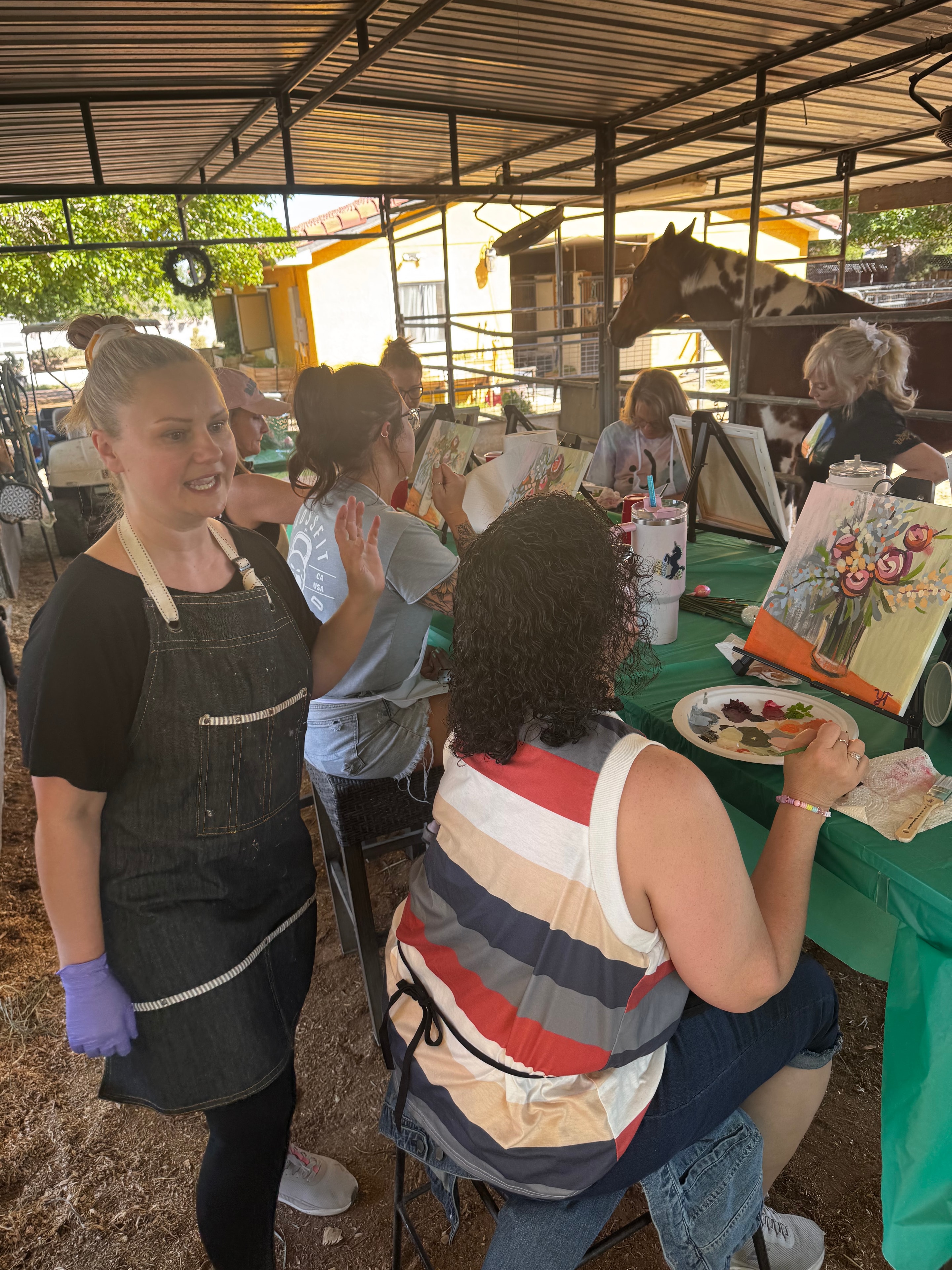 Eulia Neal professional artist instructor leading a Paint With Me party at Windrock Farm